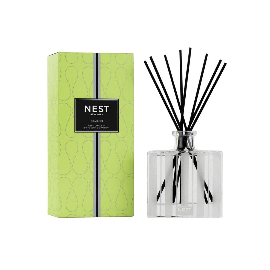 Create the aroma of a welcoming garden with this bestselling fragrance, Bamboo. This Reed Diffuser features the iconic scent’s blend of white florals with an abundance of lush green notes and hints of sparkling citrus. 5.9 fl oz | 175 ml. Expertly crafted with the highest quality fragrance oils, this Reed Diffuser releases an exquisite scent slowly and evenly into the air for approximately 90 days, delivering continuous fragrance, uninterrupted. Housed in a glass vessel etched with elegant, frosted stripes
