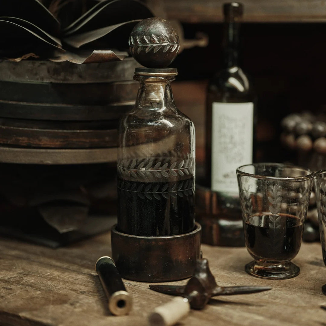Laureles Decanter with Laurel Ballin Etched & Iron Base