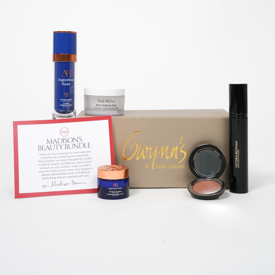 Gwynn's beauty products including a box, jars, and a card
