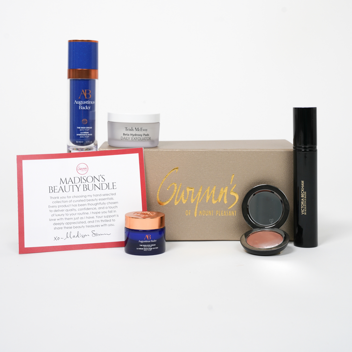 Gwynn's beauty products including a box, jars, and a card