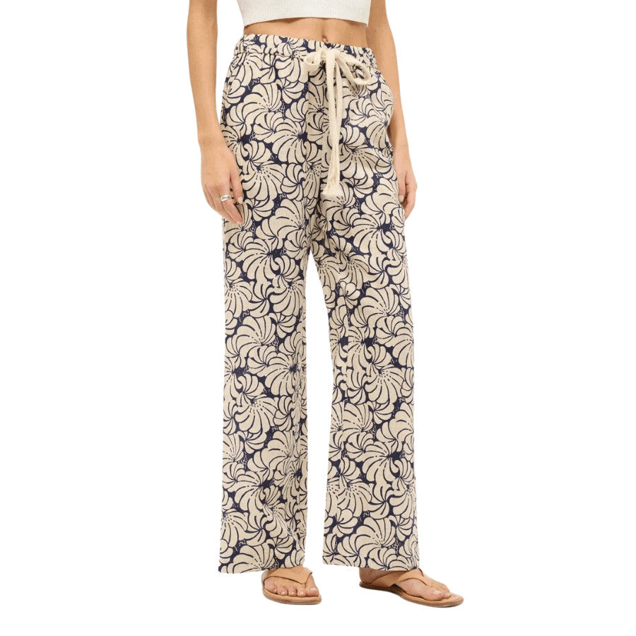 A straight leg linen pant, the Alize features a printed scallop pattern, front pockets and a drawstring waistband.  100% linen. Dry clean only.