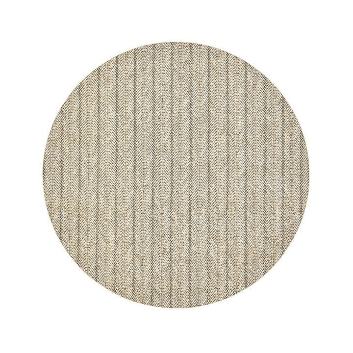 The natural-colored Herringbone Placemat has a textural element that makes it a modern-day classic. Made from woven polyvinyl, the round placemat can be easily wiped down. Its tan color makes it the perfect year-round everyday entertaining essential.
