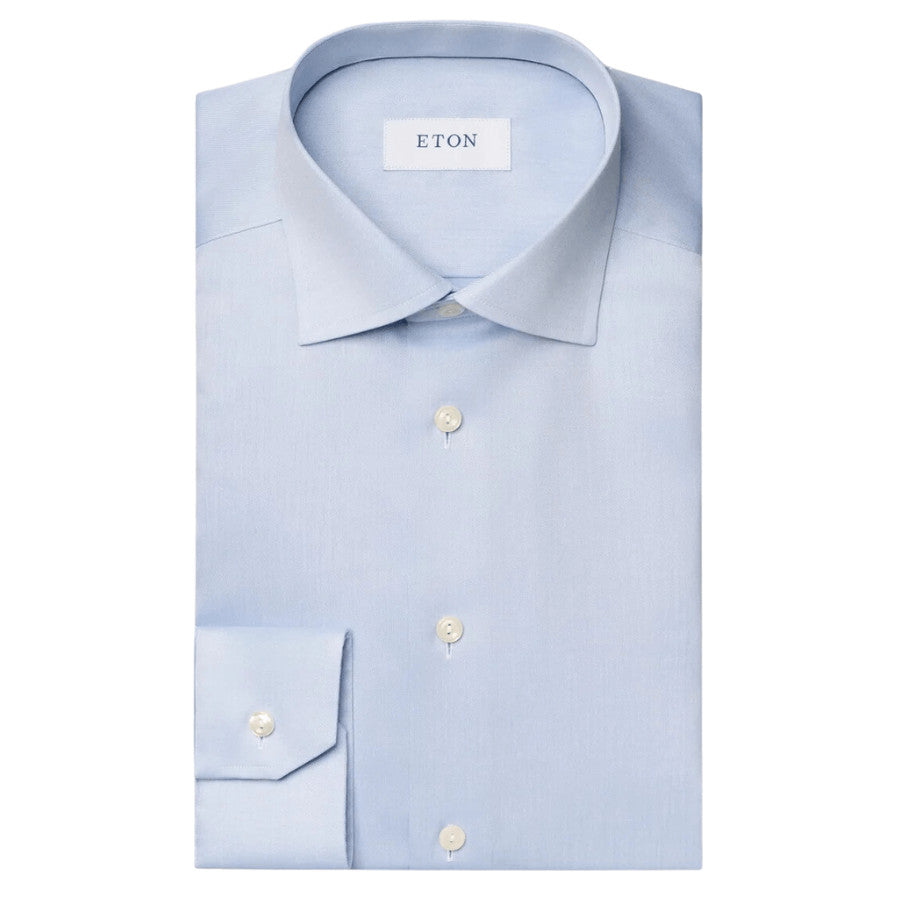 Eton's most iconic shirt offers an impeccable business look and all-day sharpness. Tailored from our wrinkle-free Signature Twill fabric, it ensures flawless draping and luster. Crafted to perfection with exquisite tailoring, it exudes timeless elegance. 100% cotton. Signature twill fabric. 