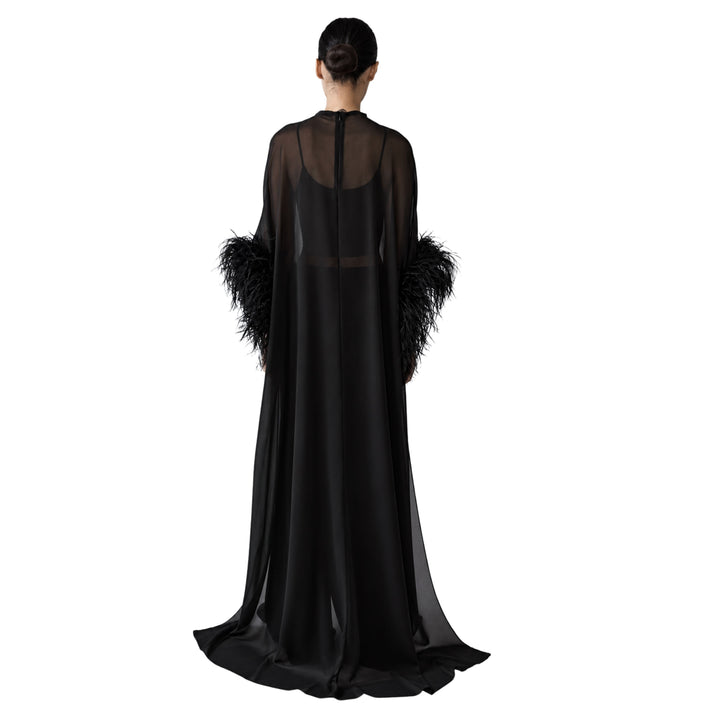 Georgette High Low Mock Neck Top With Feathers