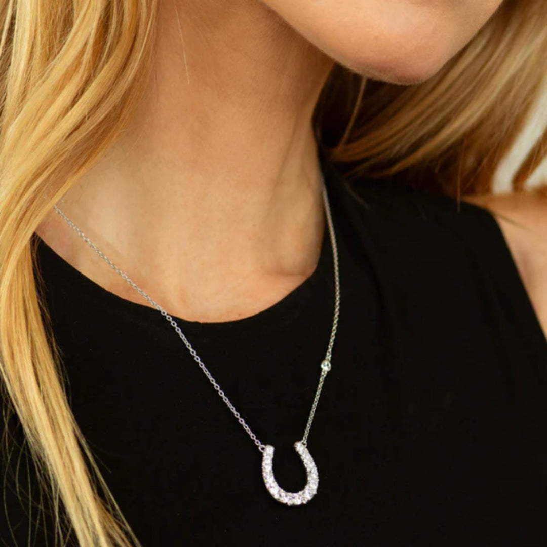 THE HORSESHOE NECKLACE WITH WHITE SAPPHIRES