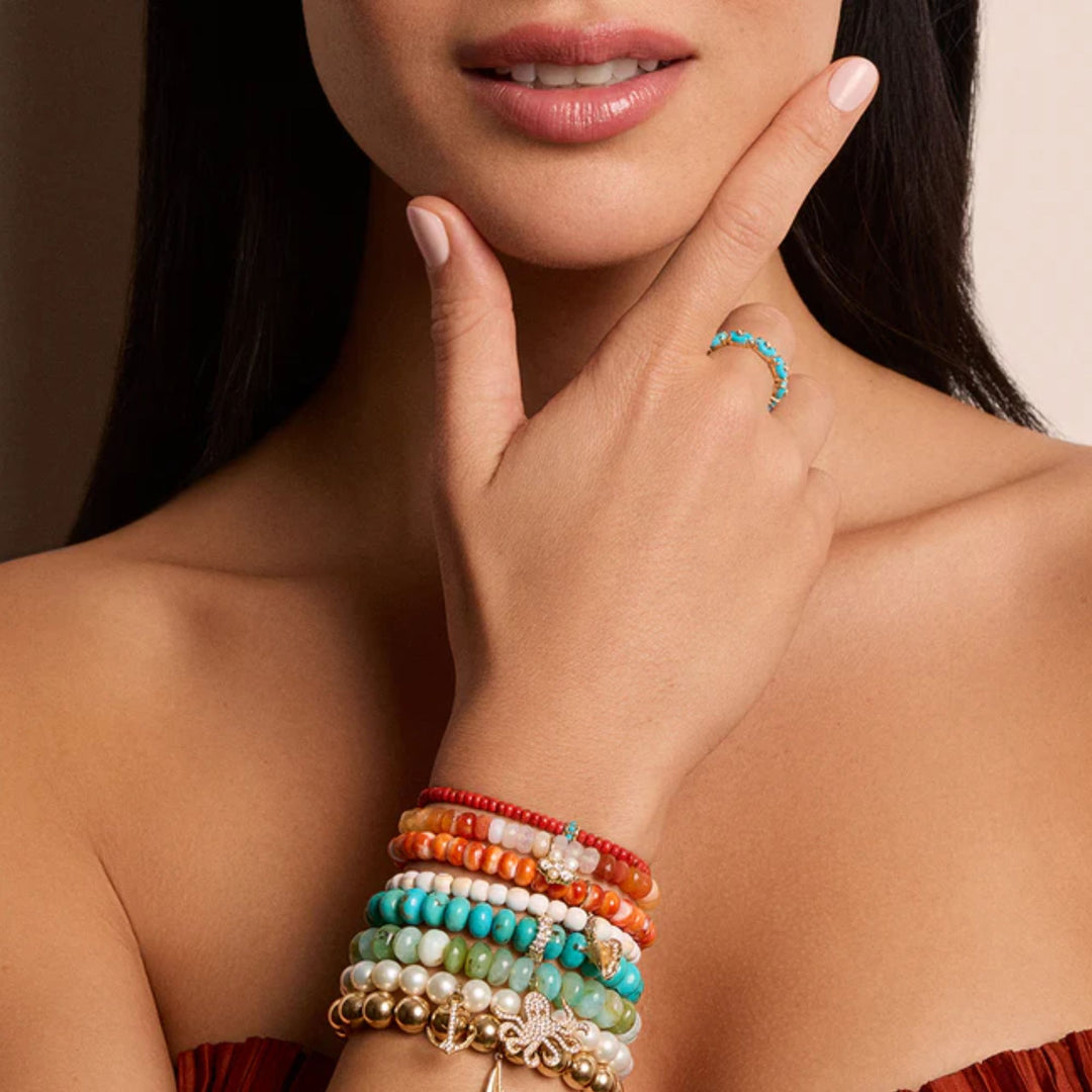 TINY CARVED TURQUOISE STONE ETERNITY RING